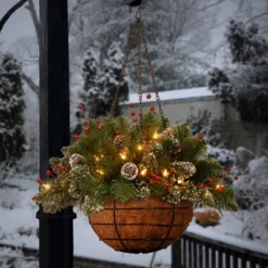 National Tree Company Pre-Lit Artificial Christmas Hanging Basket, Mountain Spruce, With Frosted Pine Cones, Berry Clusters, White Lights,20 Inches